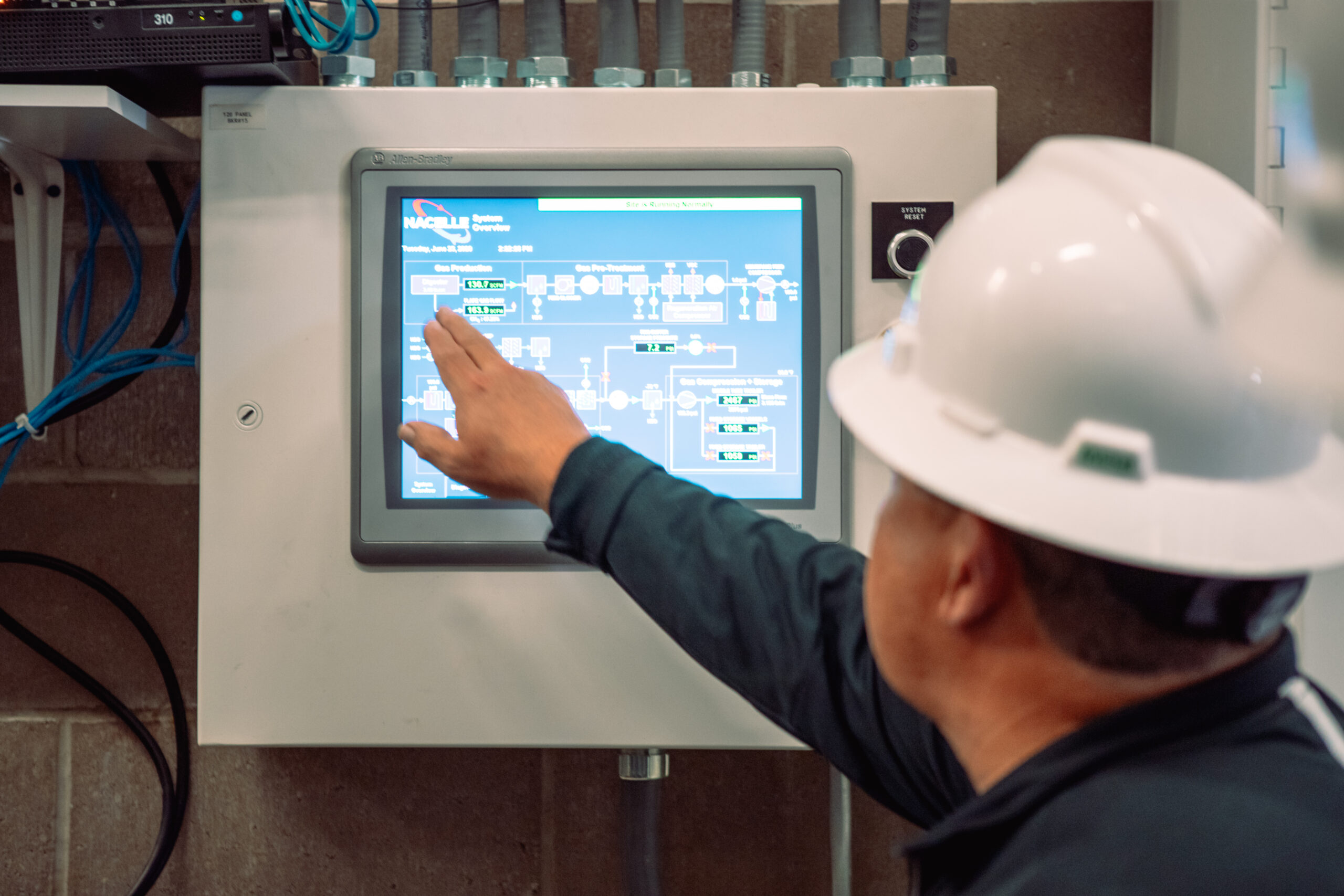 Nacelle Solutions technician operating remote SCADA monitoring system